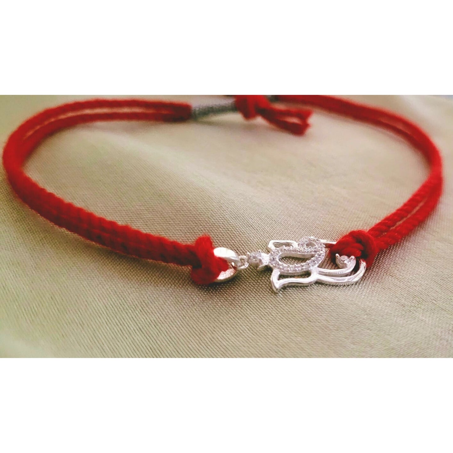 925 Silver Ganesh Rakhi cum Pendant with Swarovski Diamonds, Rhodium Plated with Anti Tarnish